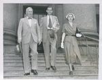 Alger Hiss (center) and his wife Priscilla walk down the steps of the United States Courthouse in Foley Square with defense attorney Lloyd Paul Stryker, NYLS Class of 1906, during Hiss’s 1950 trial. by New York Law School