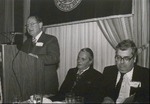 Left, at podium, Hon. Eli Wager (NYLS Class of 1954); seated, center, Hon. William Kapelman (NYLS Class of 1940); Dean E. Donald Shapiro (ca. 1980) by New York Law School