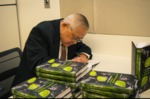 Professor Lung-chu Chen signs copies of his new book, "U.S.-Taiwan-China Relationship in International Law and Policy" by New York Law School