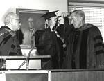 Dean E. Donald Shapiro [center] awards Walter M. Jeffords, Jr (right) the Dean’s Medal at the Third Annual Walter M. Jeffords, Jr. Distinguished Lectureship. Dean Shapiro is assisted by David Finkelstein, Vice Chairman of the Board of Trustees by New York Law School