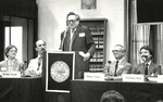 SCRIBES Conference Dr. Peter Grudin, unknown man at rostrum, William Zinsser, & Professor James Simon by New York Law School